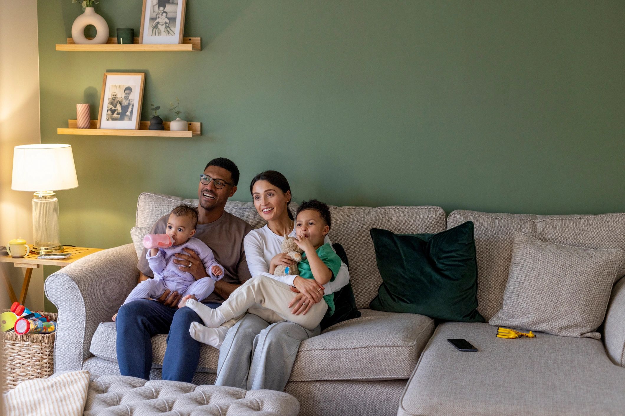 Family relaxing together in a cozy living room