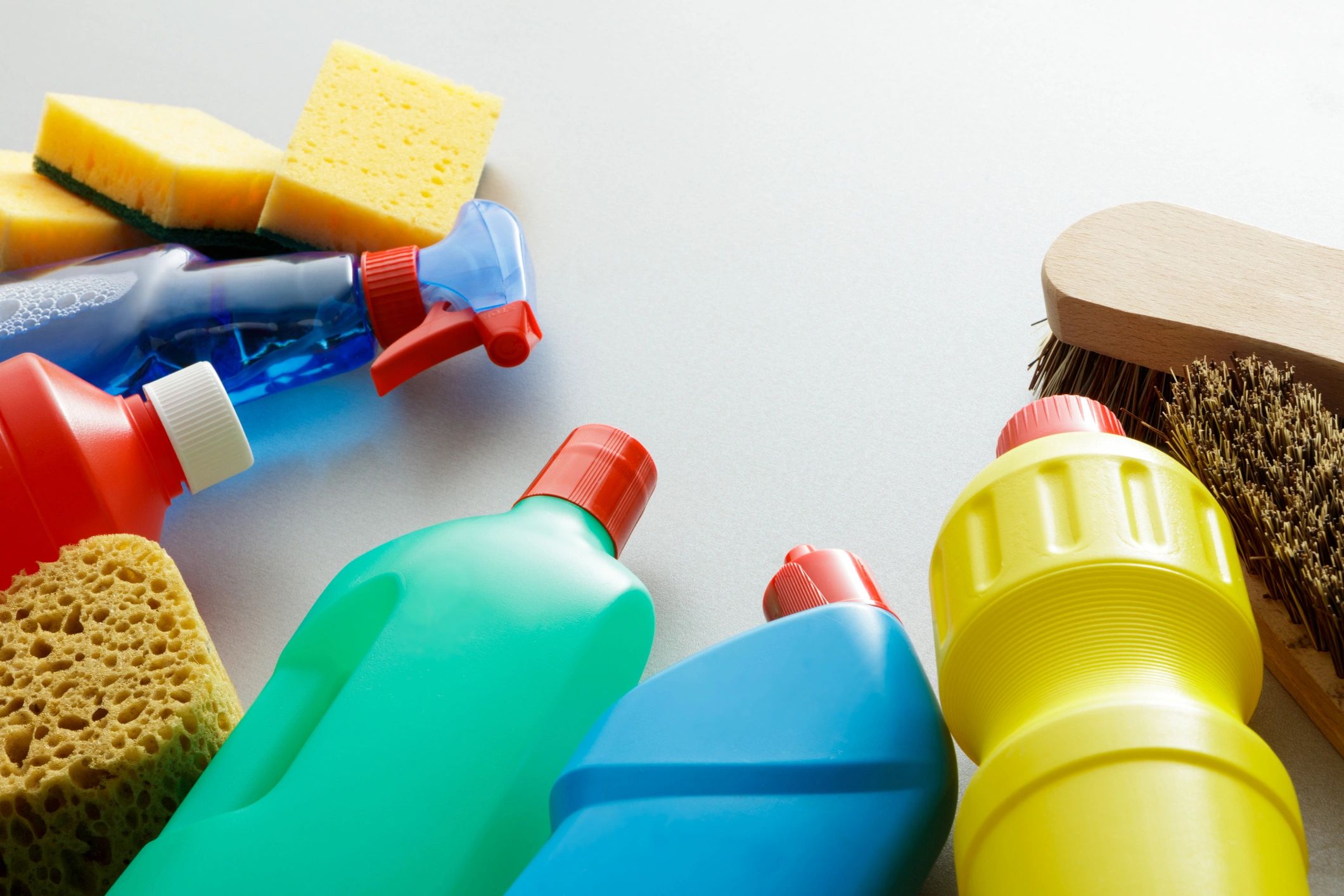 Assorted laundry and cleaning products arranged on a surface